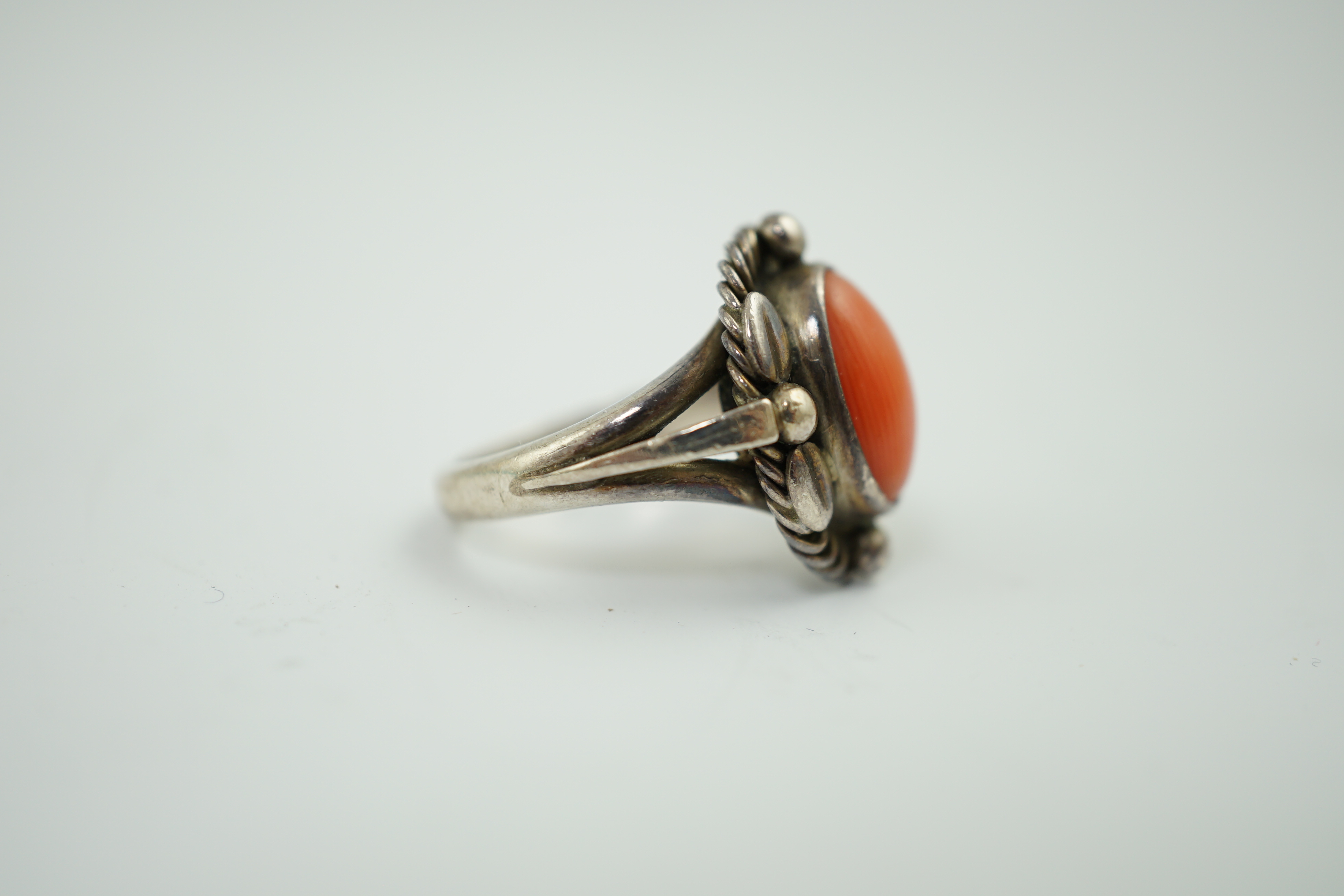 A Georg Jensen sterling silver and cabochon coral set ring